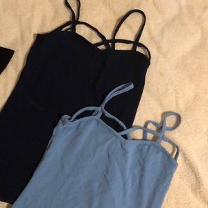 two cross camisoles